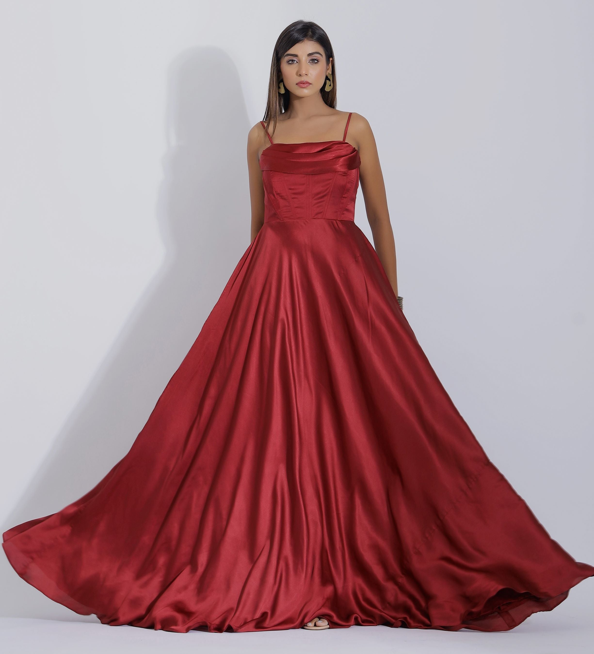 corset dress in maroon color and satin fabric