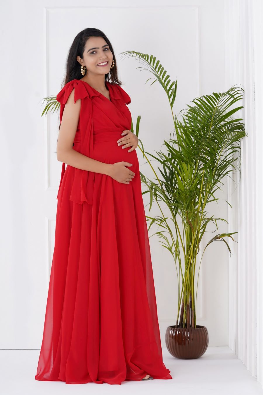 Radiant Red: Georgette Baby Shower Gown with Bow Ties and Pleated Belt Plum and Peaches Radiant Red: Georgette Baby Shower Gown with Bow Ties and Pleated Belt Plum and Peaches