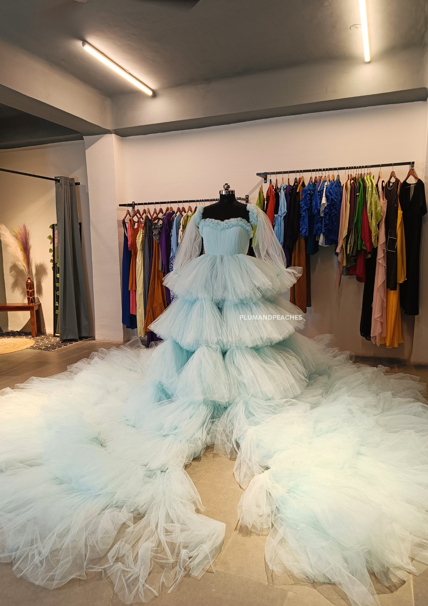 Tulle gown with long trail ful