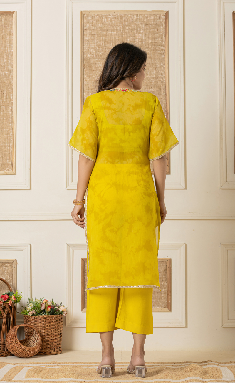 back side of three piece yellow kurta set